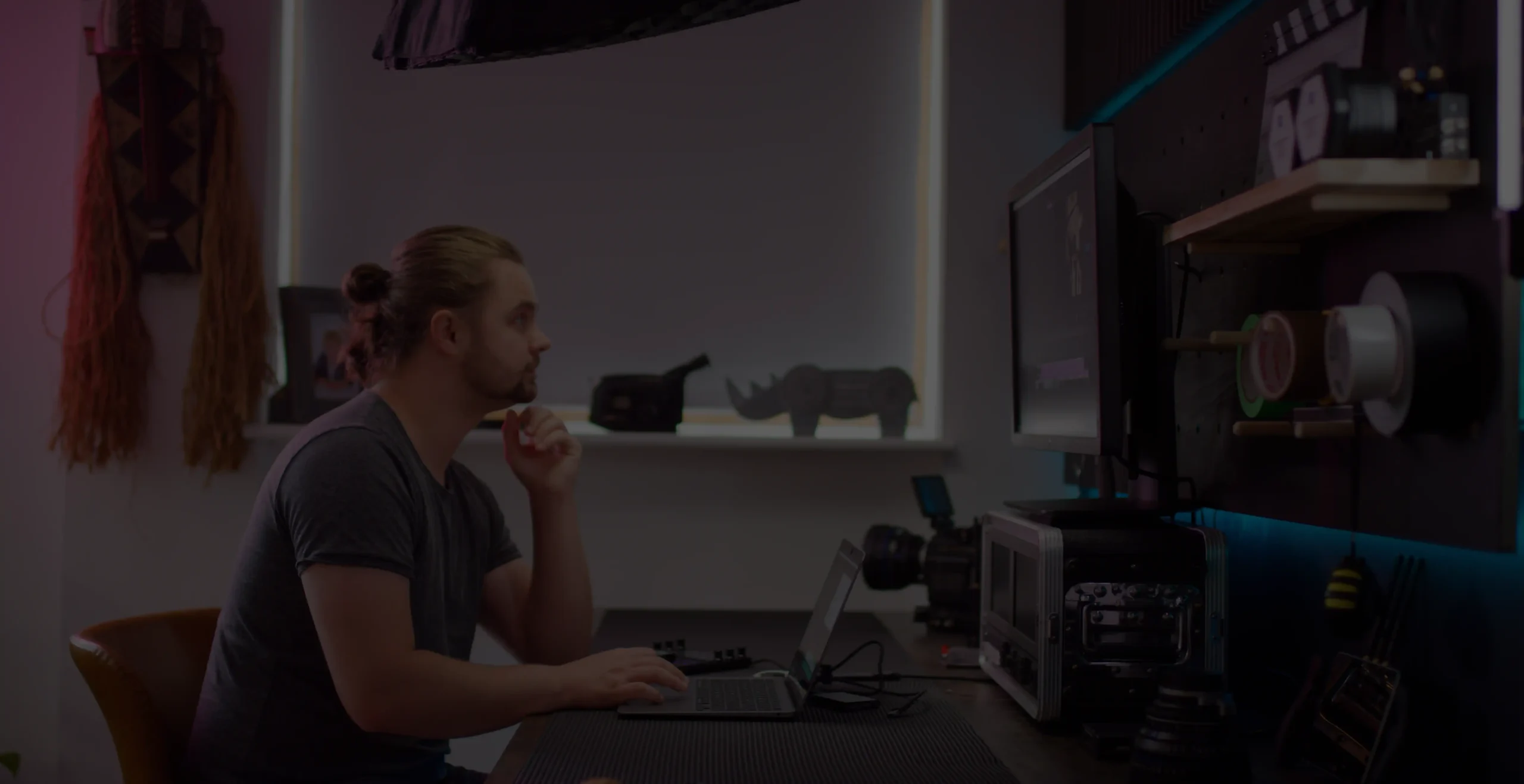 Robert Sutton at a desk working
